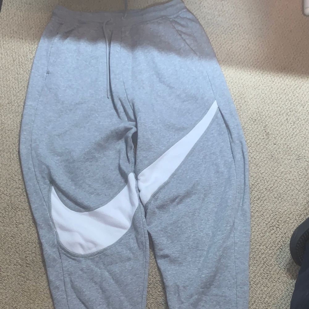 Nike womens Light Gray Joggers with White Swoosh size medium